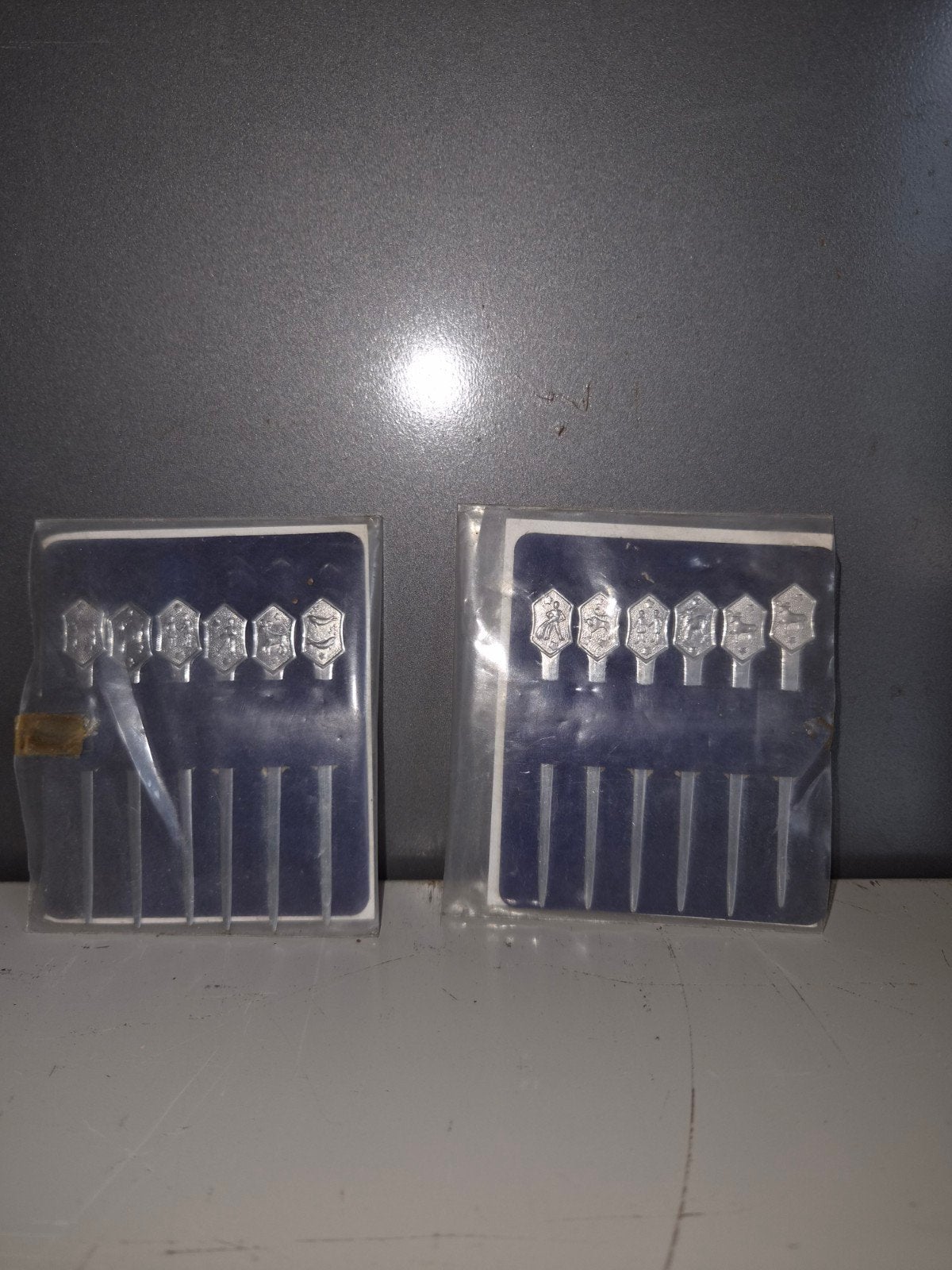 Complete set Royco cocktailprikkers 12 sterrenbeelden RVS, Huis en Inrichting, Zilver, Ophalen of Verzenden, Metaal, Overige merken