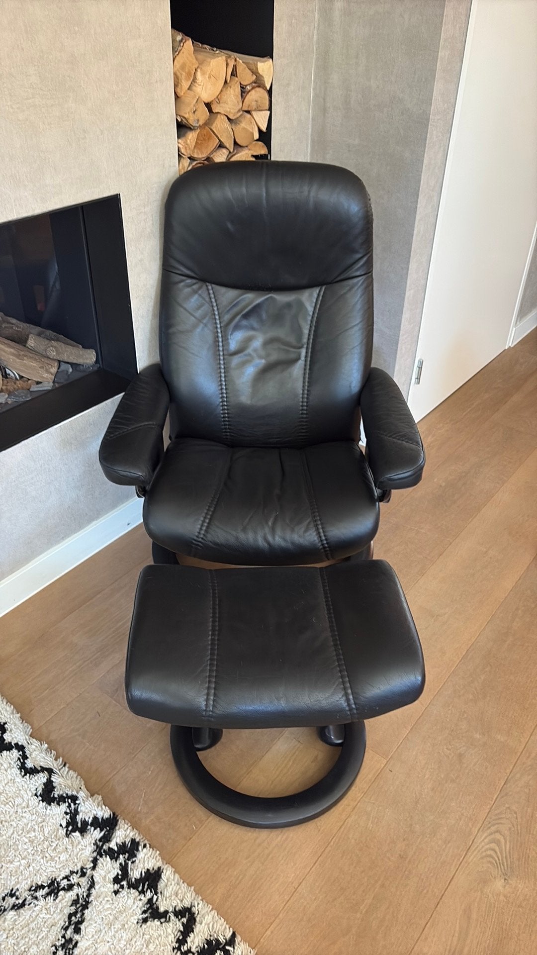 Zwarte leren relaxfauteuil met voetenbank (stressless) maatM