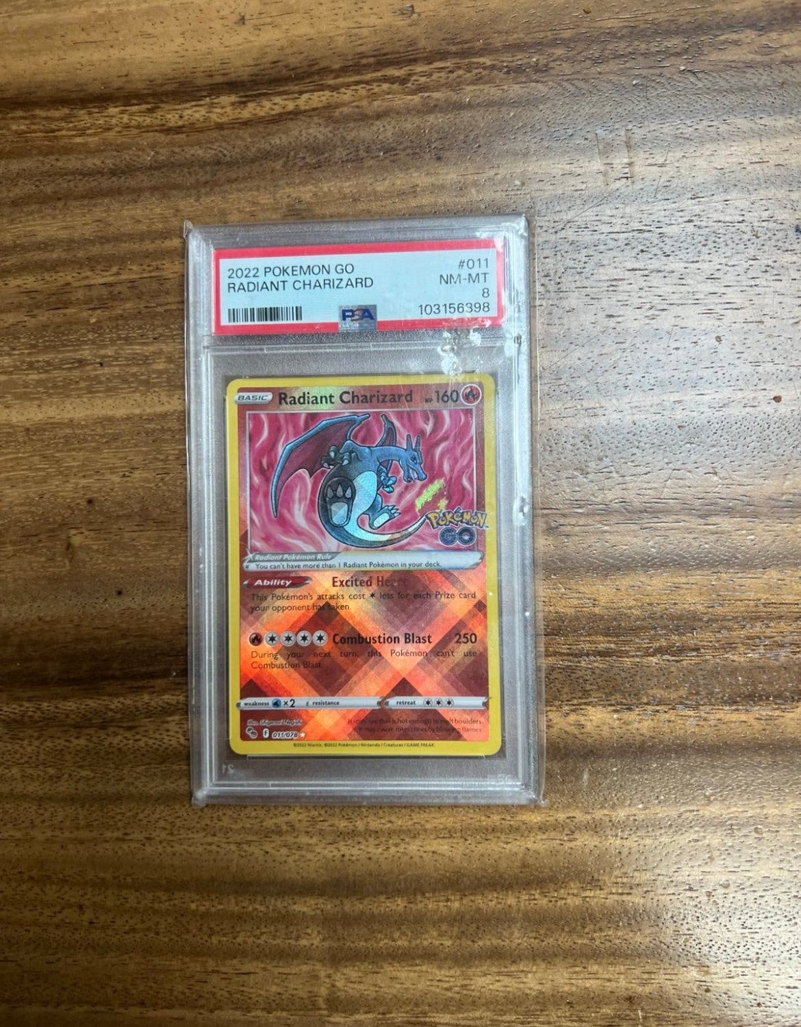 Radiant Charizard psa 8, Verzenden, Zo goed als nieuw