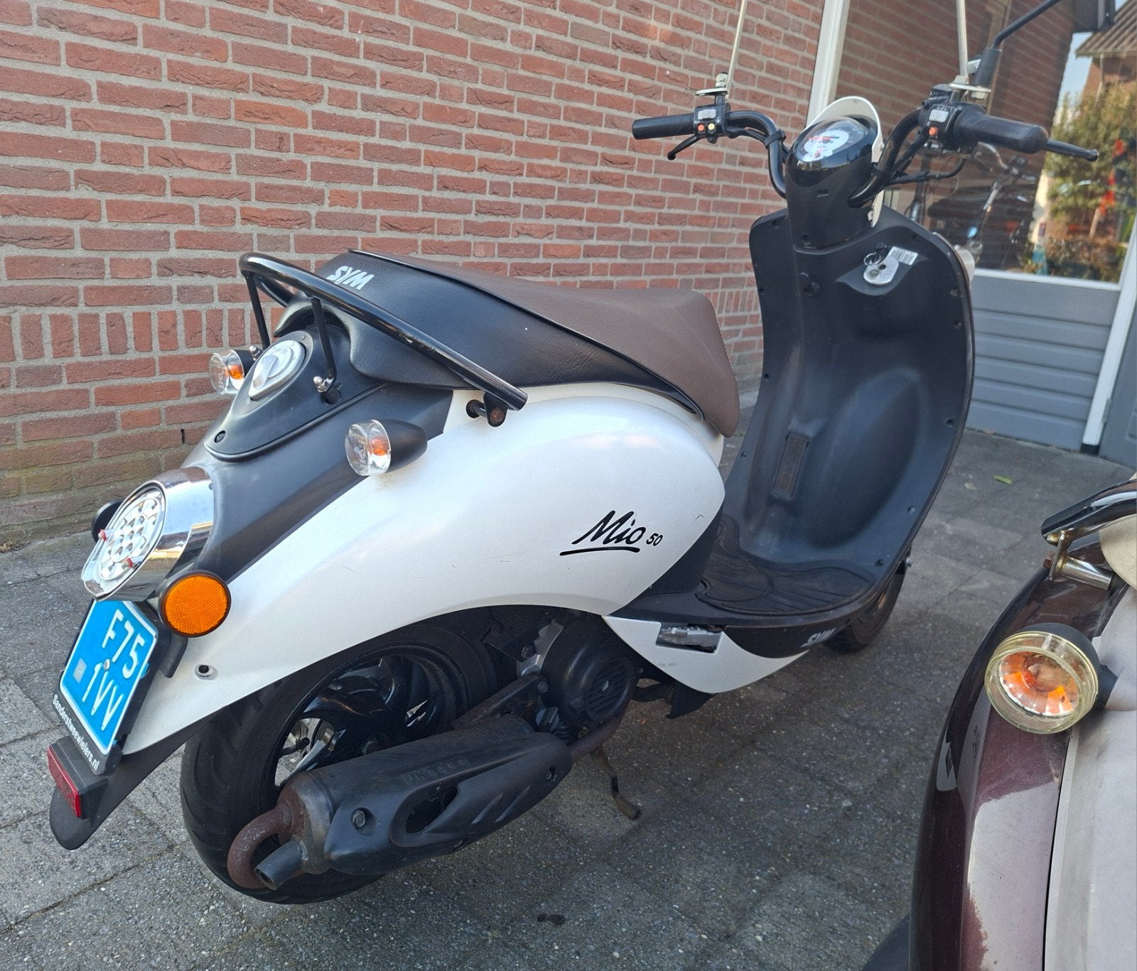 zeer nette goedlopende Sym Mio 50. Met lichte voorschade., Zo goed als nieuw, Benzine, Maximaal 25 km/u, Ophalen