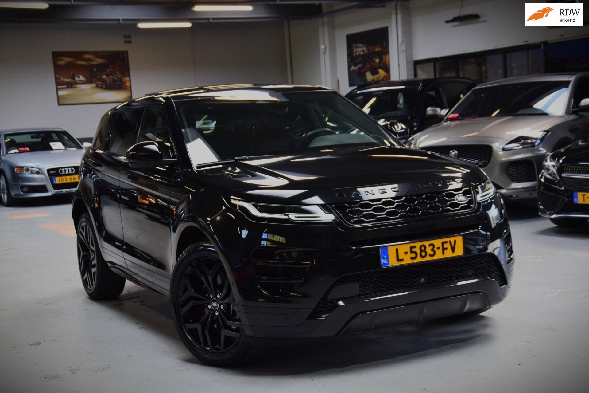 Land Rover Range Rover Evoque 1.5 P300e AWD R-Dynamic 1e Eig, Auto's, Dealer onderhouden, Zwart, Vierwielaandrijving, Hybride Elektrisch/Benzine