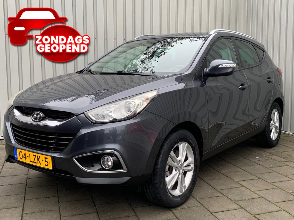 Hyundai Ix35 2.0i Business Edition|Navigatie|149000KM|Climat, Gebruikt, Zwart, 4 cilinders, Leder en Stof