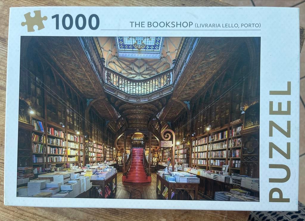 Puzzel 1000 stukjes - Boekwinkel in Porto Livraria Lello, Hobby en Vrije tijd, Denksport en Puzzels, Gebruikt, Legpuzzel, 500 t/m 1500 stukjes