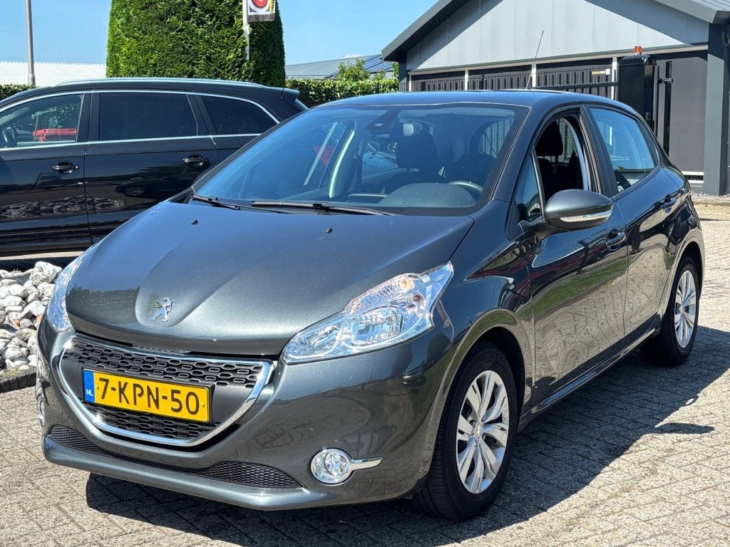 Peugeot 208 1.2 VTI Envy 2013 5-Deurs Navi 30.000 KM NL Auto, Auto's, Peugeot, Euro 5, Stof, Gebruikt, 31 €/maand