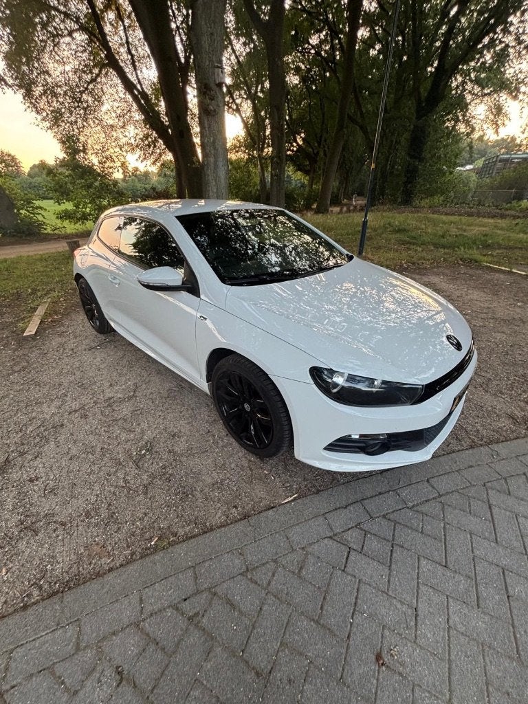 Volkswagen Scirocco 1.4 TSI 90KW BMT 2010 Wit, Auto's, Voorwielaandrijving, 4 cilinders, 4 stoelen, 1219 kg