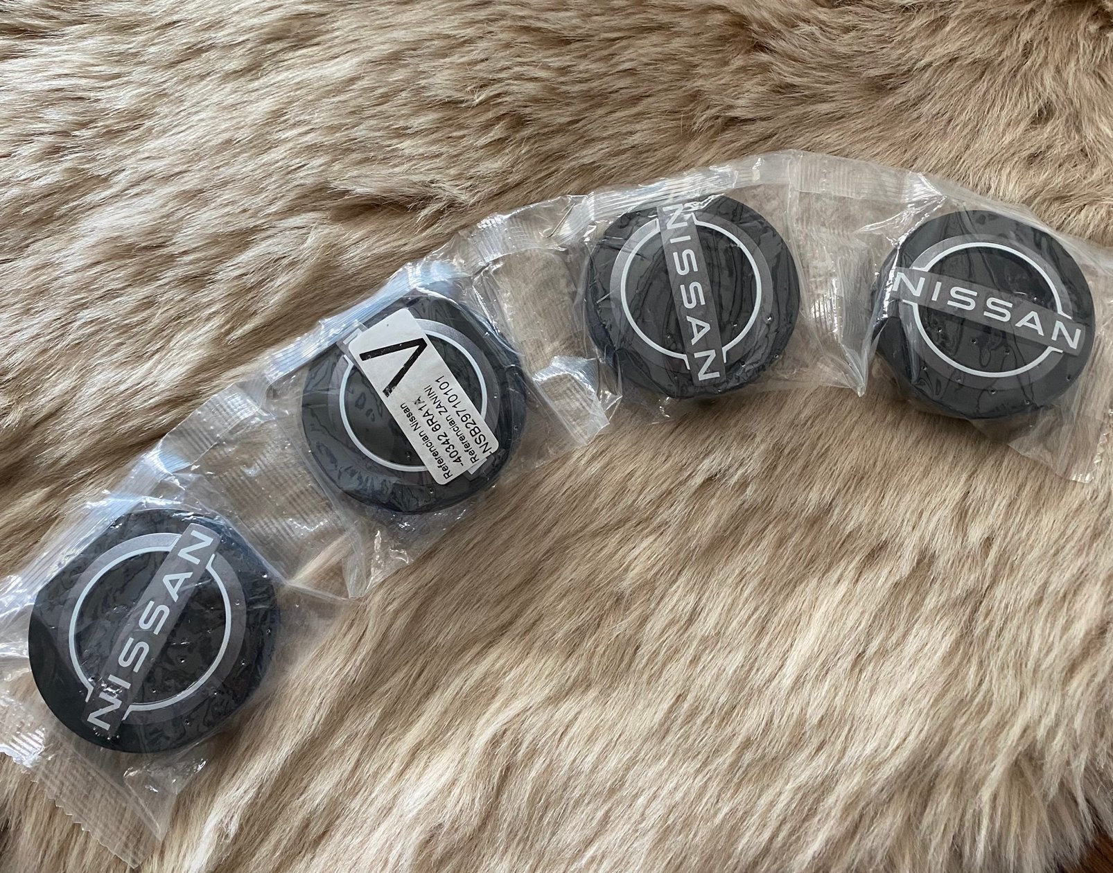 Nieuwe wielnaafdoppen voor Nissan 60 mm doorsnee, Ophalen of Verzenden, Nieuw, Nissan