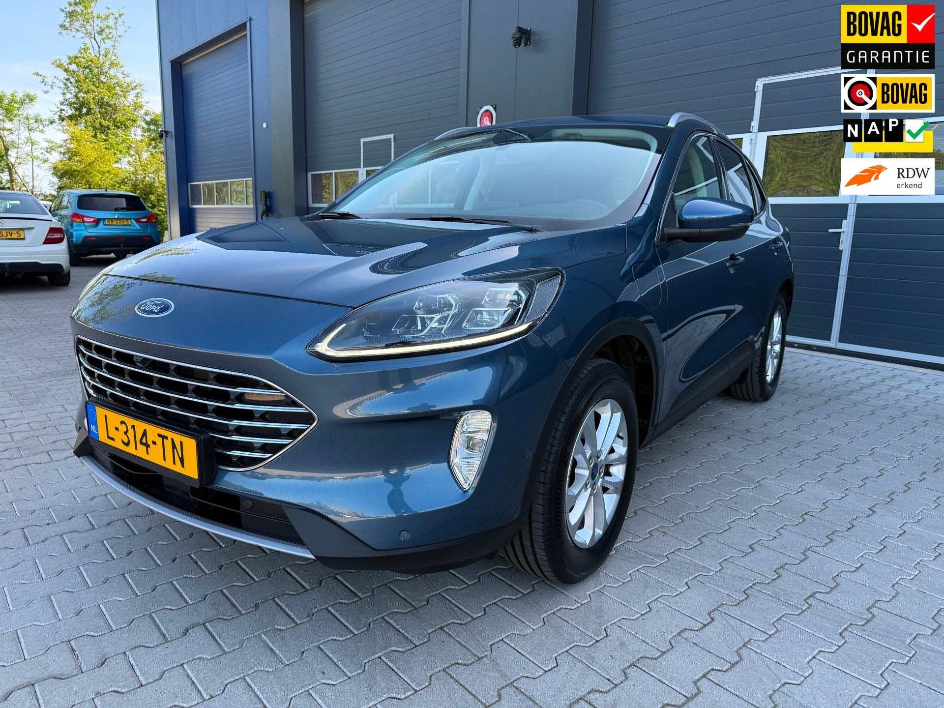 Ford Kuga 2.5 PHEV Titanium X DRIVER ASS. EN WINTER PACK, Dealer onderhouden, Gebruikt, Euro 6, 4 cilinders