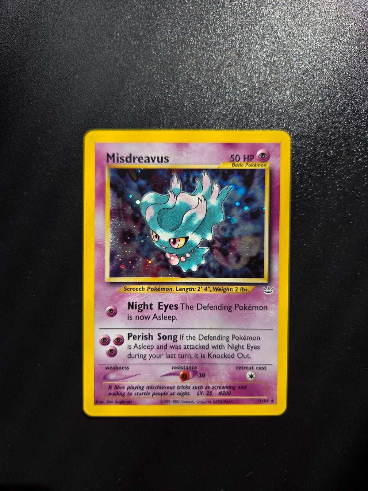 Misdreavus Neo Revelation 11/64 Pokemon holo WOTC, Ophalen of Verzenden, Zo goed als nieuw, Booster, Foil