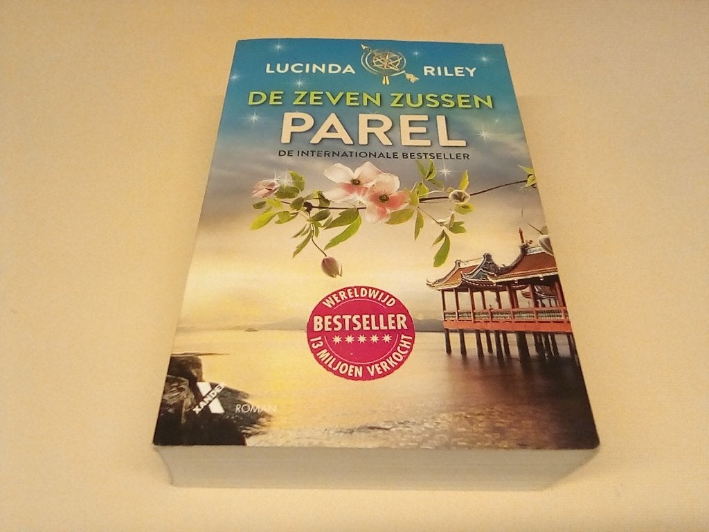 De Zeven Zussen - Parel door Lucinda Riley, Boeken, Lucinda Riley, Ophalen of Verzenden, Zo goed als nieuw, Nederland