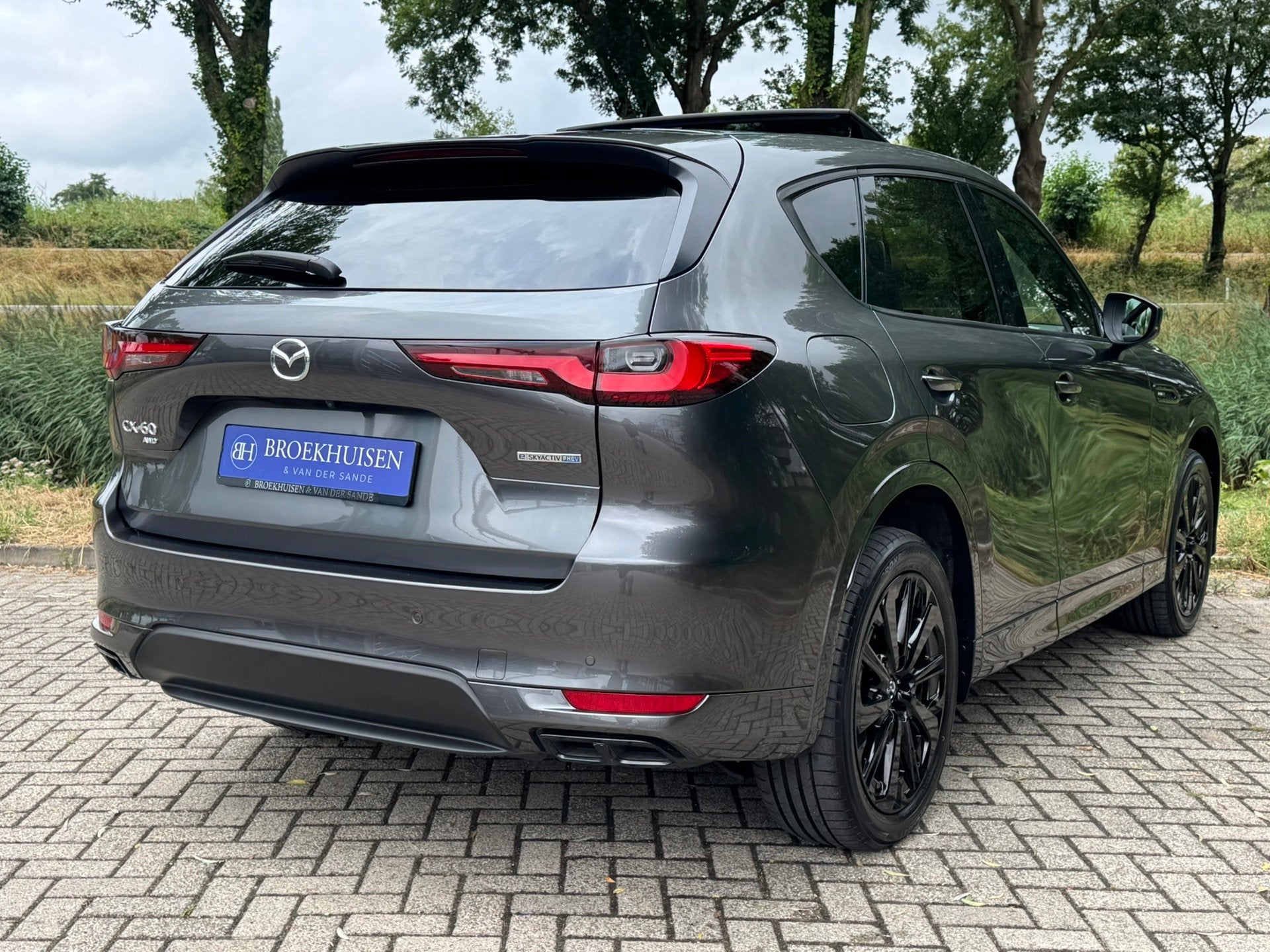 Mazda CX-60 2.5 e-SkyActiv PHEV Homura Plus 327pk Panoramada, Automaat, Gebruikt, Zwart, 4 cilinders