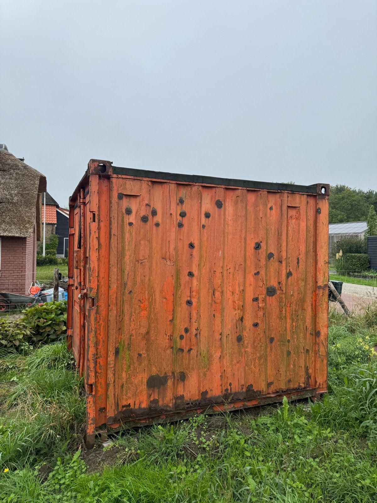 Gebruikte opslagcontainer - Oranje, Ophalen