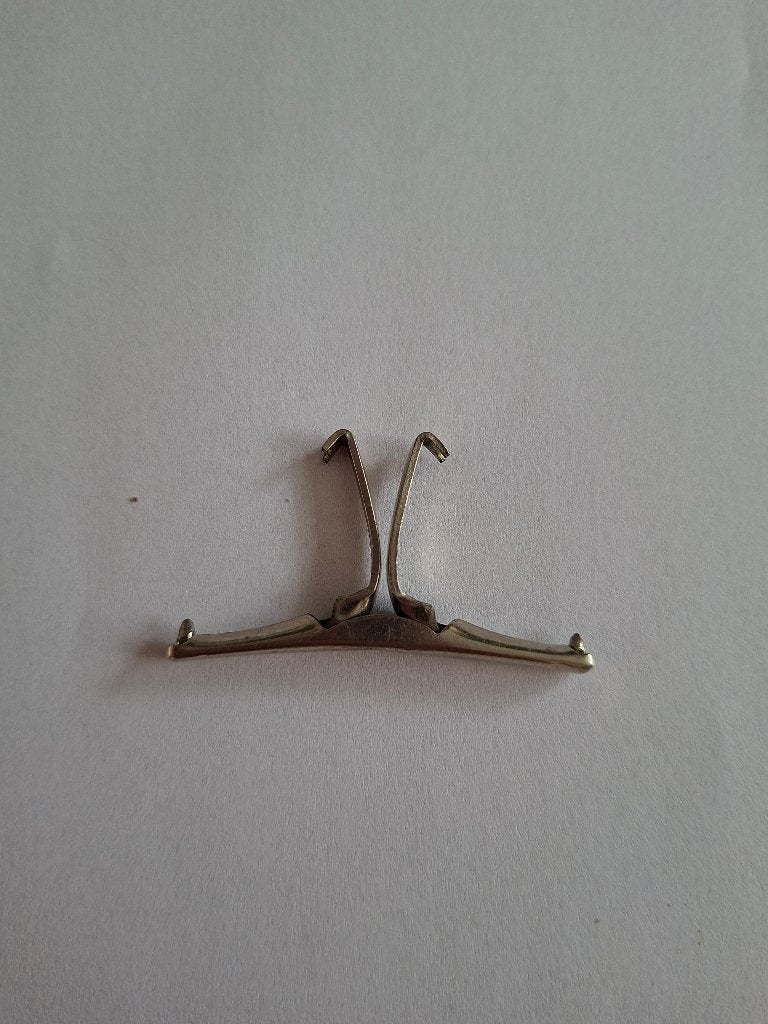 kraagspeld/klem. Vintage. Tenax. Kaulusklipsi.lengte 4 cm., Ophalen of Verzenden, Zo goed als nieuw, Zilver