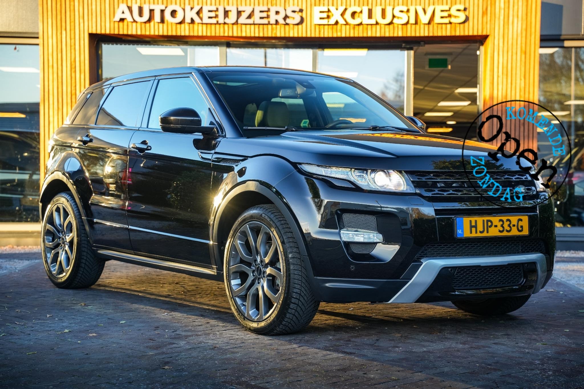 Land Rover Range Rover Evoque 2.0 Si 4WD Prestige Dynamic St, Auto's, Euro 5, 4 cilinders, Zwart, Leder