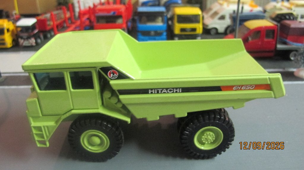 Conrad? Hitachi EH 650 Nieuw Schaal 1:50 zonder doos, Hobby en Vrije tijd, Ophalen of Verzenden, Nieuw, Bus of Vrachtwagen, Conrad