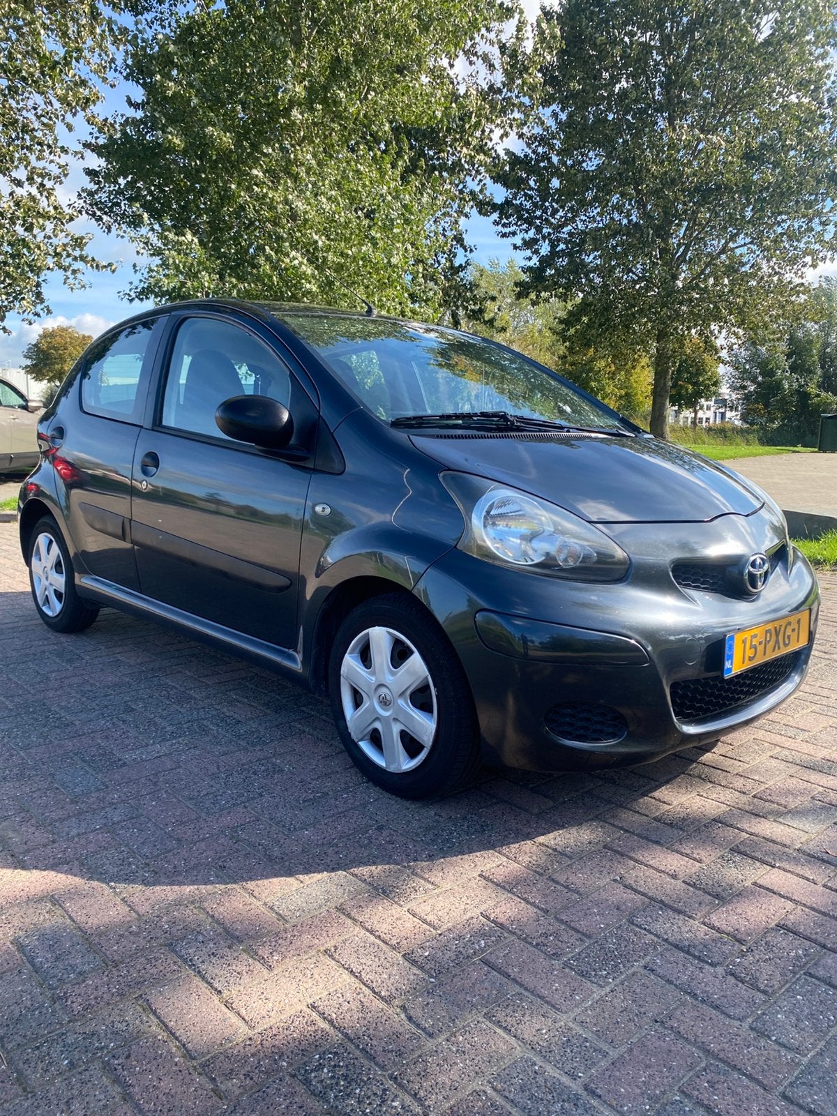 Toyota Aygo 1.0 12V Vvt-i 5DRS 2011-Airco-Navigator., Auto's, Voorwielaandrijving, Stof, Zwart, 4 stoelen