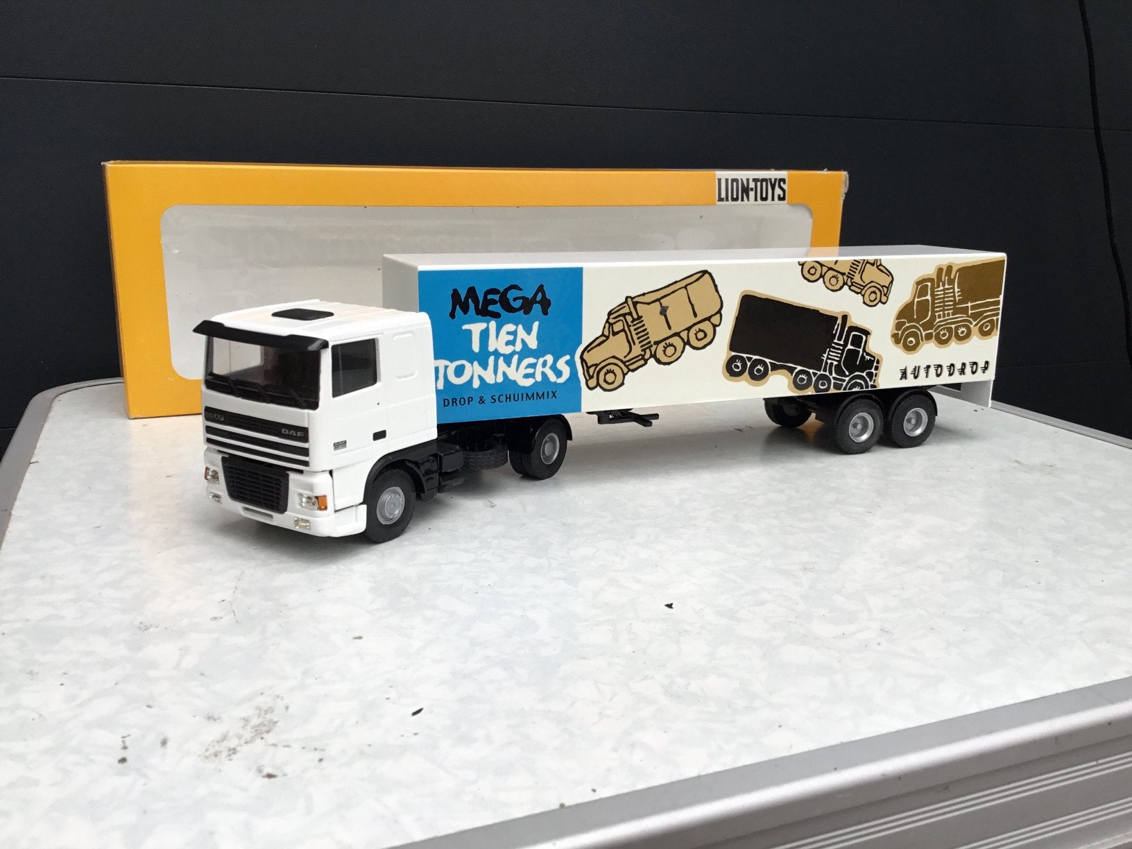 Lion car Daf XF Autodrop, Hobby en Vrije tijd, Modelauto's | 1:50, Ophalen of Verzenden, Zo goed als nieuw, Bus of Vrachtwagen