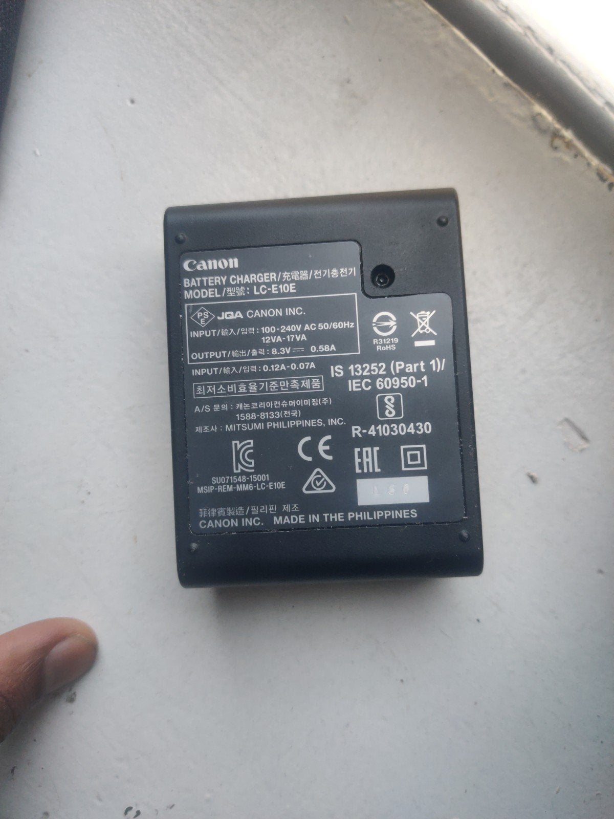Canon LC-E10E acculader voor Canon EOS camera's, Ophalen of Verzenden, Gebruikt, Oplaadbaar