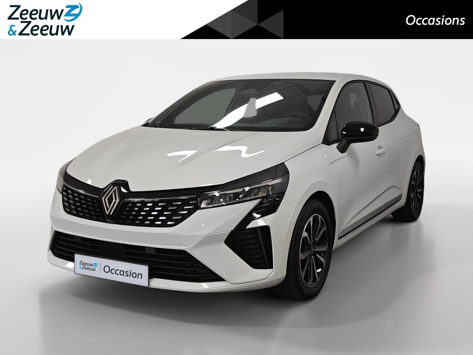 Renault Clio 1.6 E-Tech Full Hybrid 145 techno AUTOMAAT NAVI, Auto's, 12 maanden, Euro 6, Leder en Stof, Wit