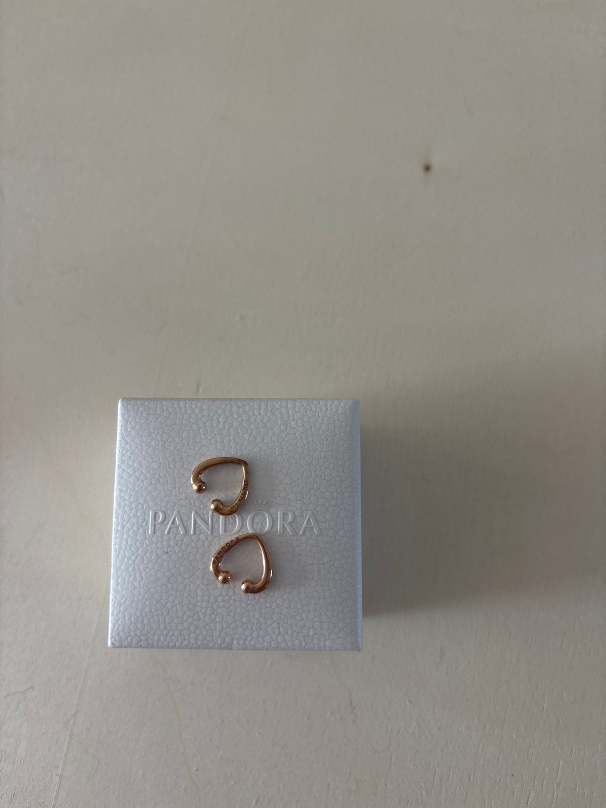 2 Pandora ear cuffs in rosé goud, Hangers, Ophalen of Verzenden, Zo goed als nieuw, Roze