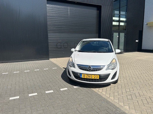 Opel Corsa 1.2 Ecoflex 51KW 3D 2012 Wit 129 DKM Airco Apk nw, Auto's, Voorwielaandrijving, Euro 5, 40 €/maand, Zwart