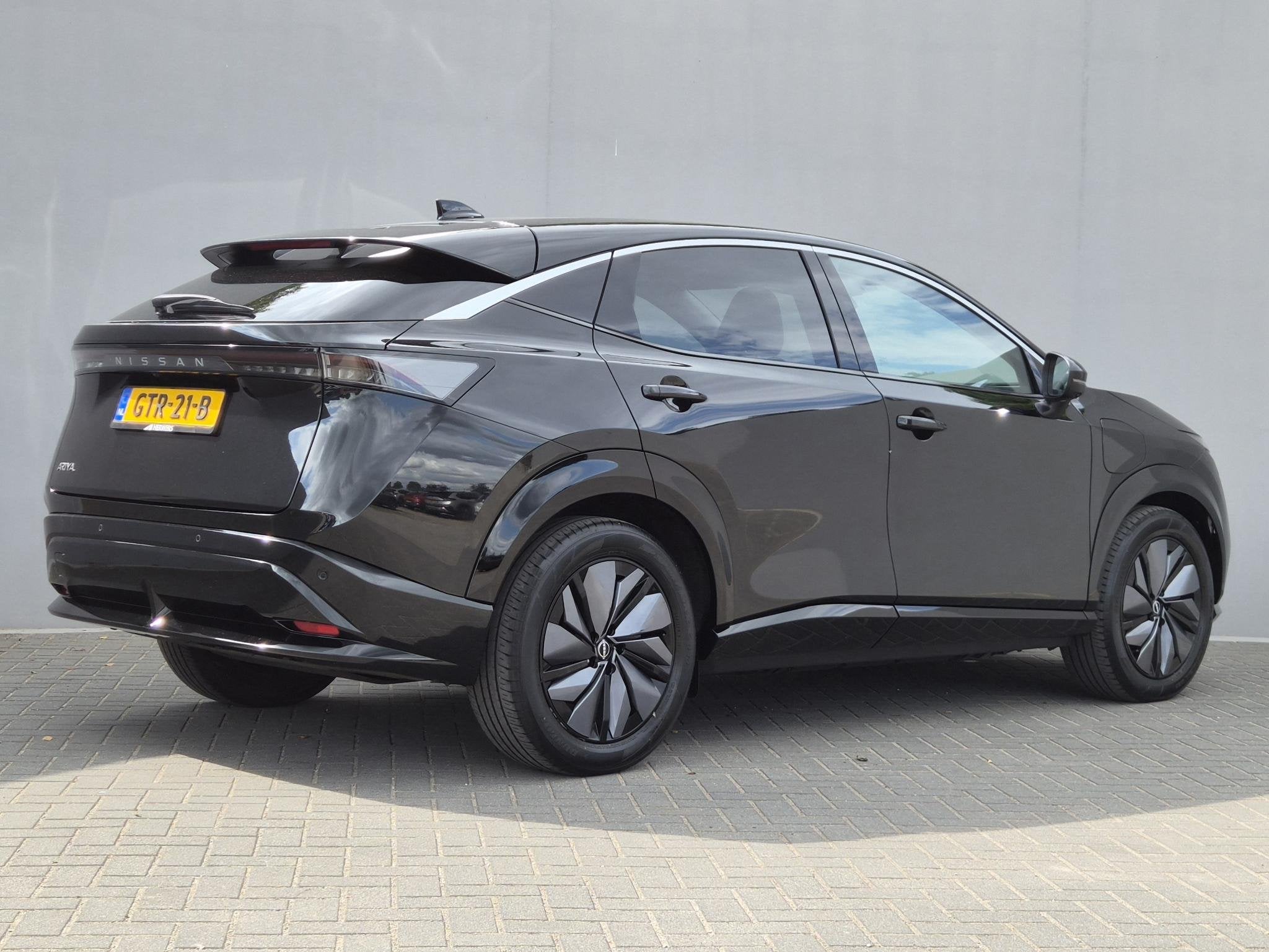 Nissan Ariya Advance 91 kWh / SOH 99% / Fabrieksgarantie tot, Auto's, 750 kg, Leder en Stof, Zwart, Ariya