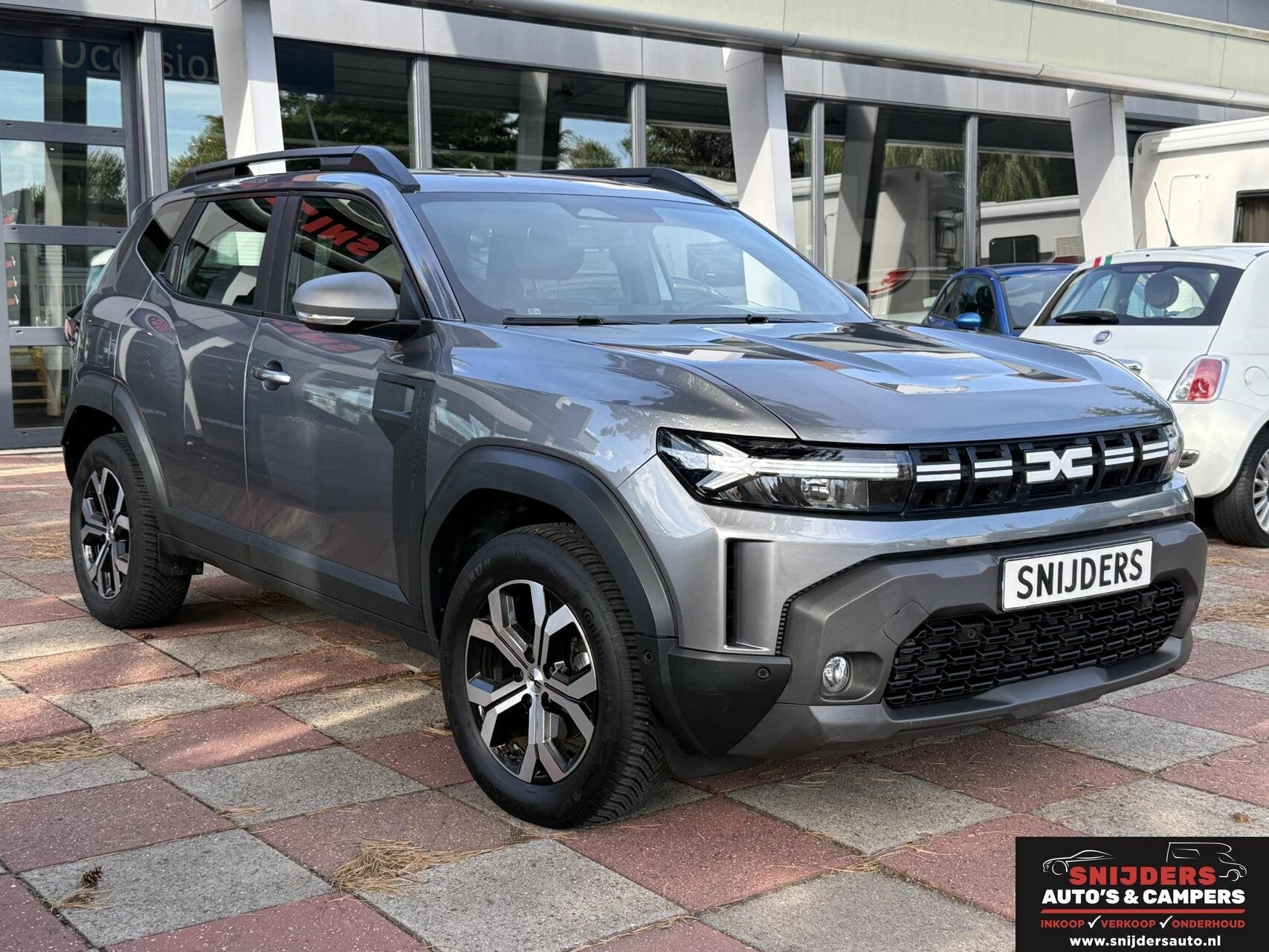 Dacia Duster 1.2 TCe 130 mild hybrid 4x4 Expression trekhaak, Auto's, Stof, Gebruikt, Zwart, 1199 cc