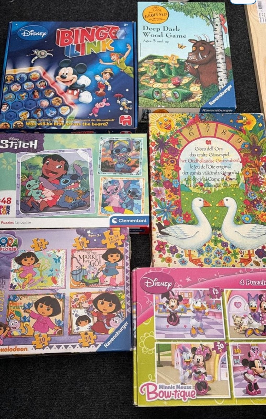 Stitch en andere puzzels en spellen, Ophalen of Verzenden, 10 tot 50 stukjes, Zo goed als nieuw