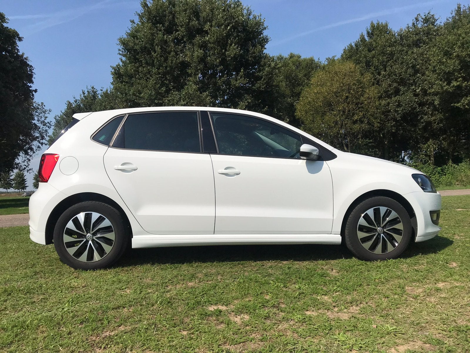 Volkswagen Polo 1.4 TDI 55KW BMT 2014 Wit, Auto's, Voorwielaandrijving, Multifunctioneel stuurwiel, 74 pk, 580 kg