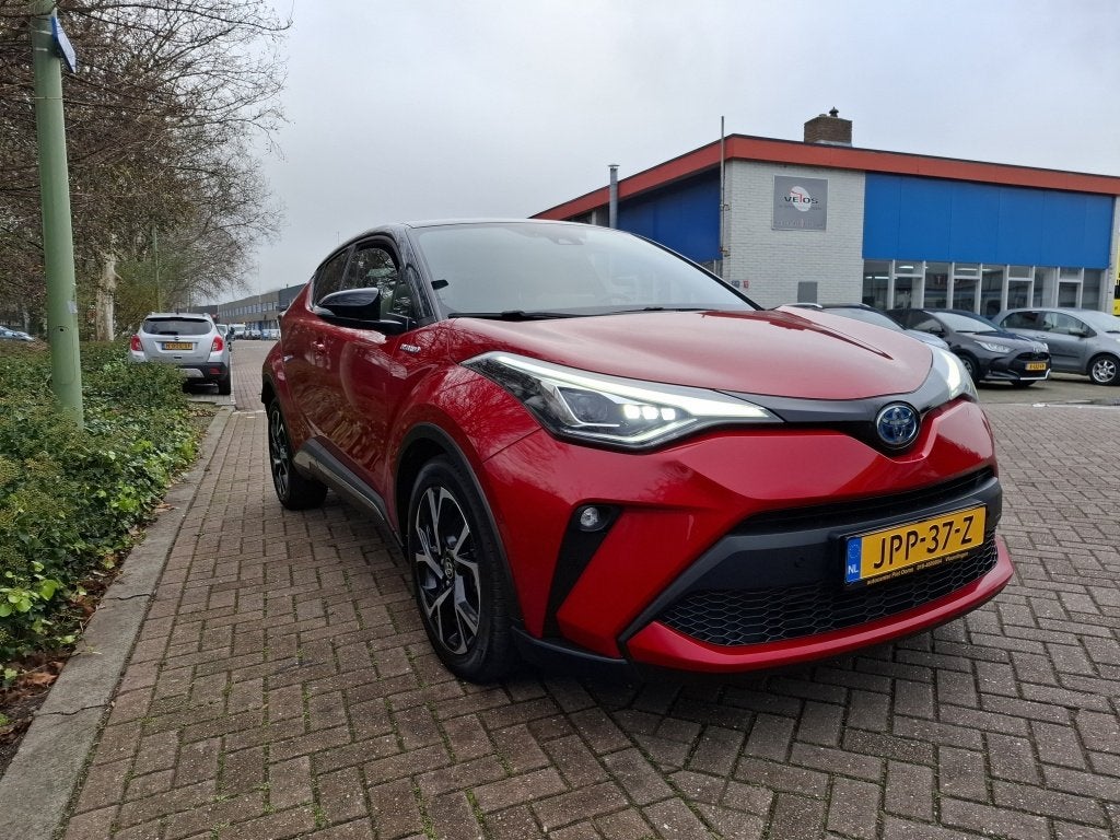 Toyota C-HR 1.8 Hybrid Executive Bi-Tone trekhaak (bj 2022), Auto's, 12 maanden, Euro 6, 4 cilinders, 98 pk