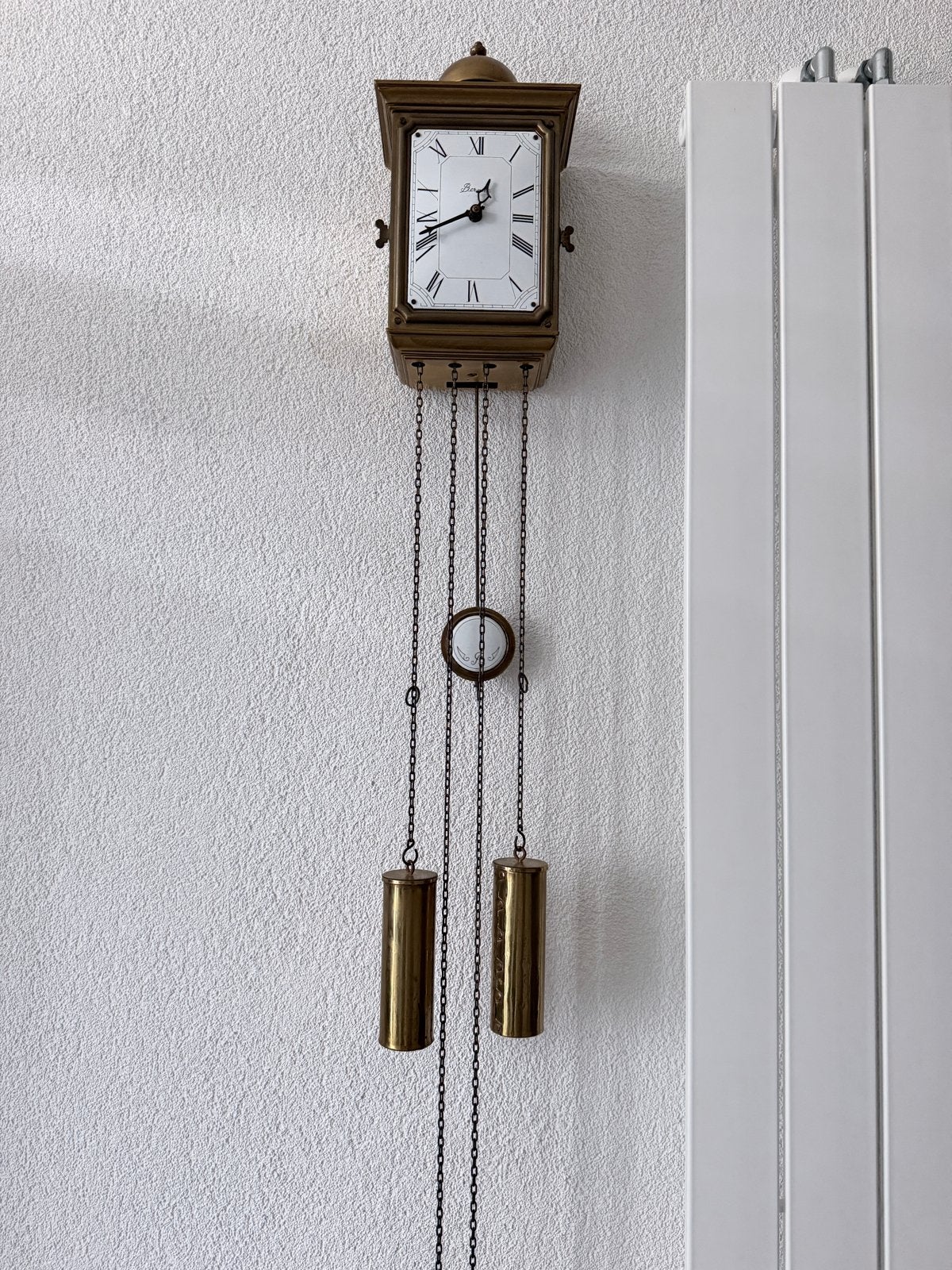 Bernice wandklok met kettingen en gewichten, Ophalen