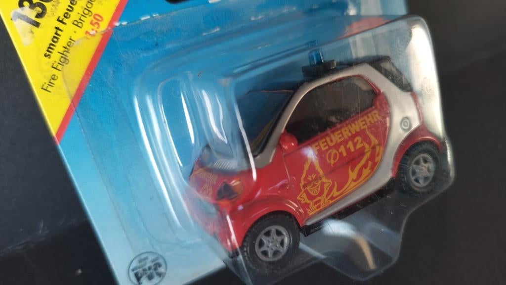 Smart City Coupe Feuerwehr 1:55 Siku 1303 Pol, Hobby en Vrije tijd, Modelauto's | Overige schalen, Schlittenbacherstrasse 60 Lüdenscheid Germany