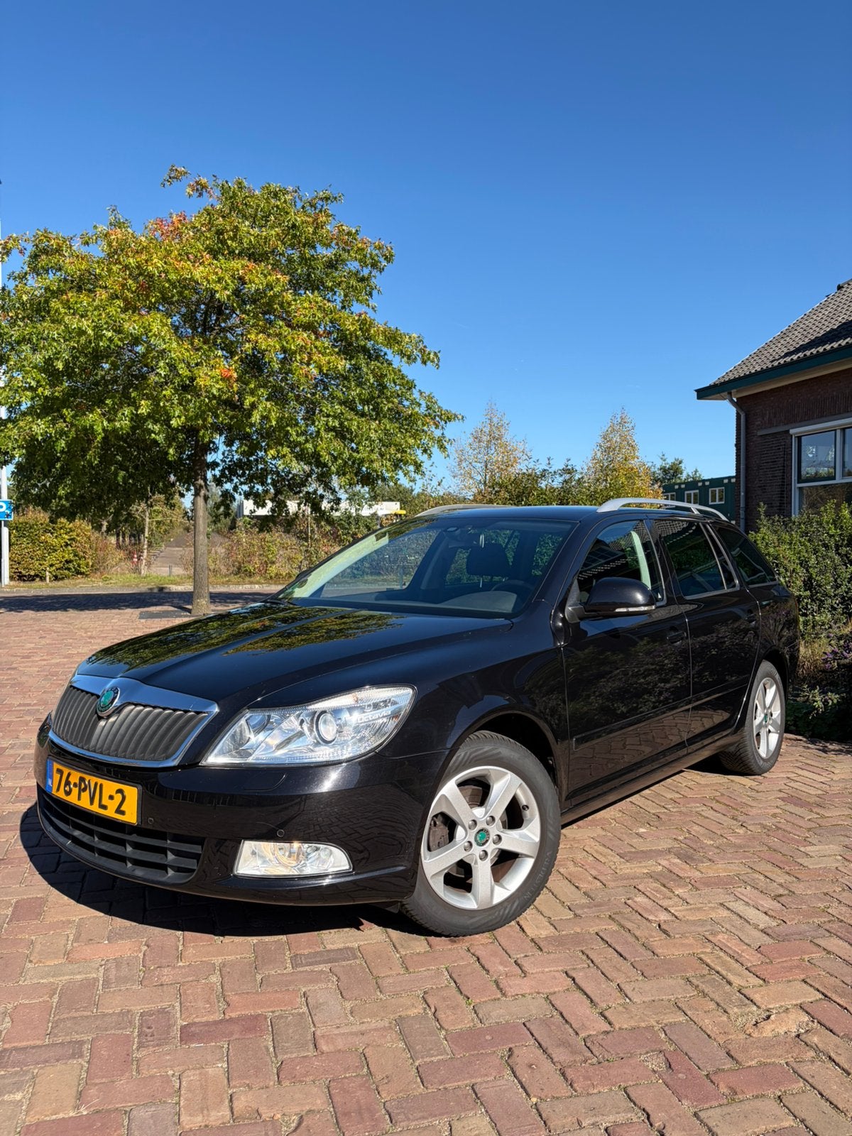 Škoda Octavia Combi 1.2 TSI DSG | 1e eigenaar | CarPlay, Auto's, Stof, Zwart, 4 cilinders, Zwart