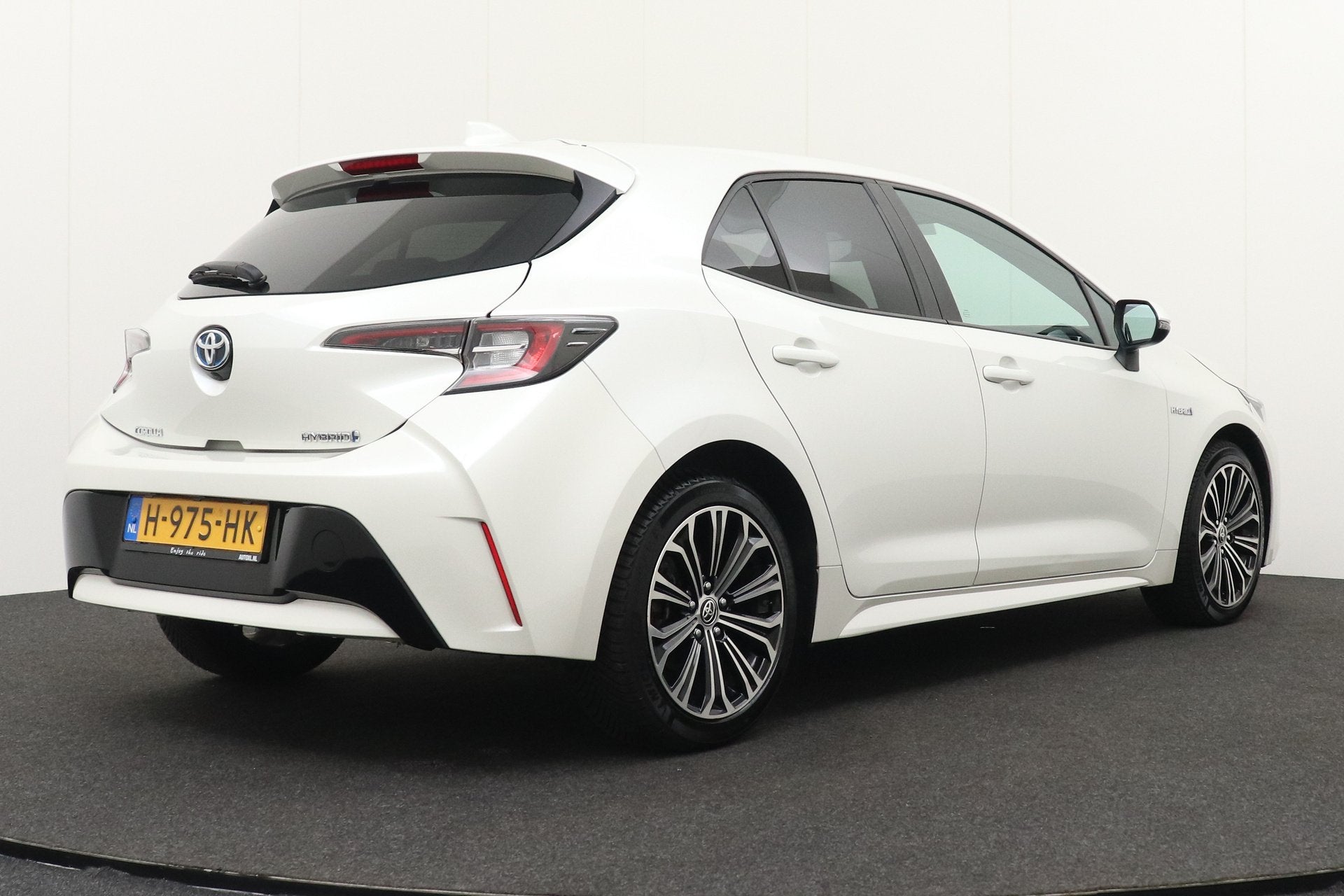 Toyota Corolla 1.8 Hybrid Business Plus Carplay Adapt. Cruis, Auto's, Gebruikt, 4 cilinders, Stoelverwarming, Corolla