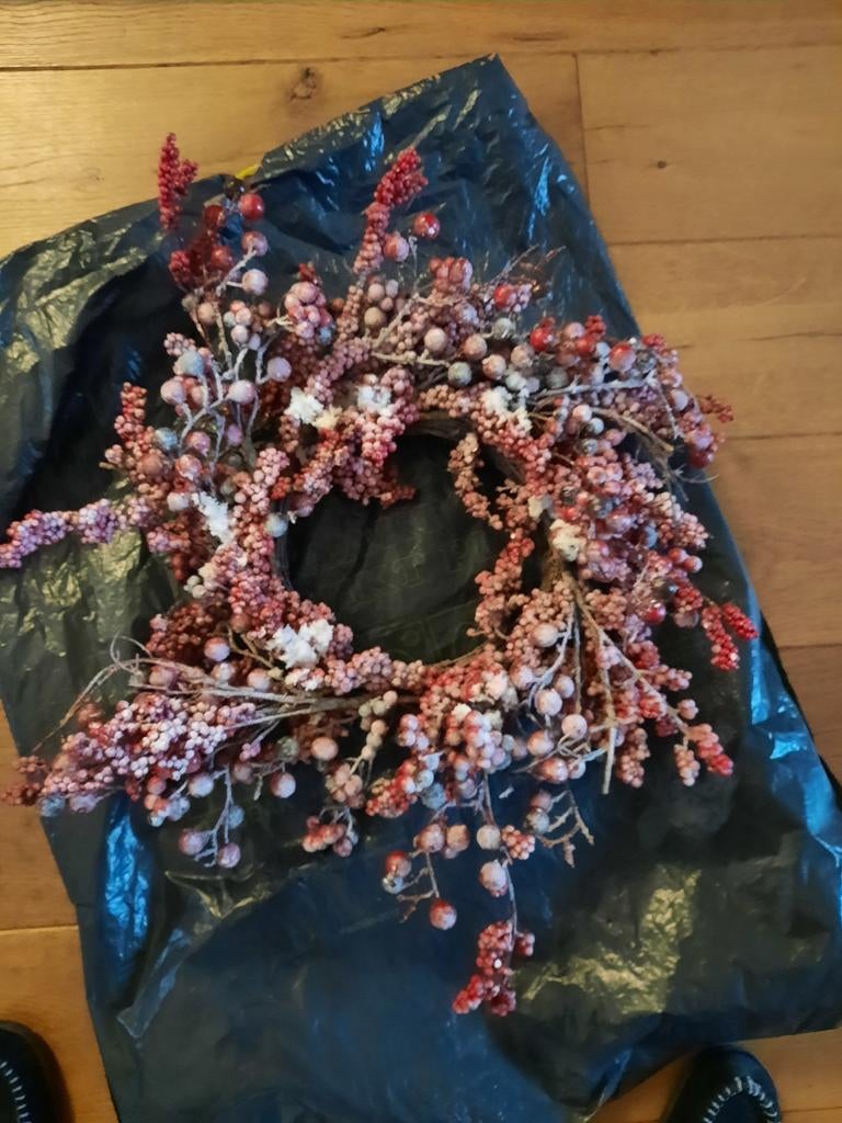 Kerstkrans, Ophalen