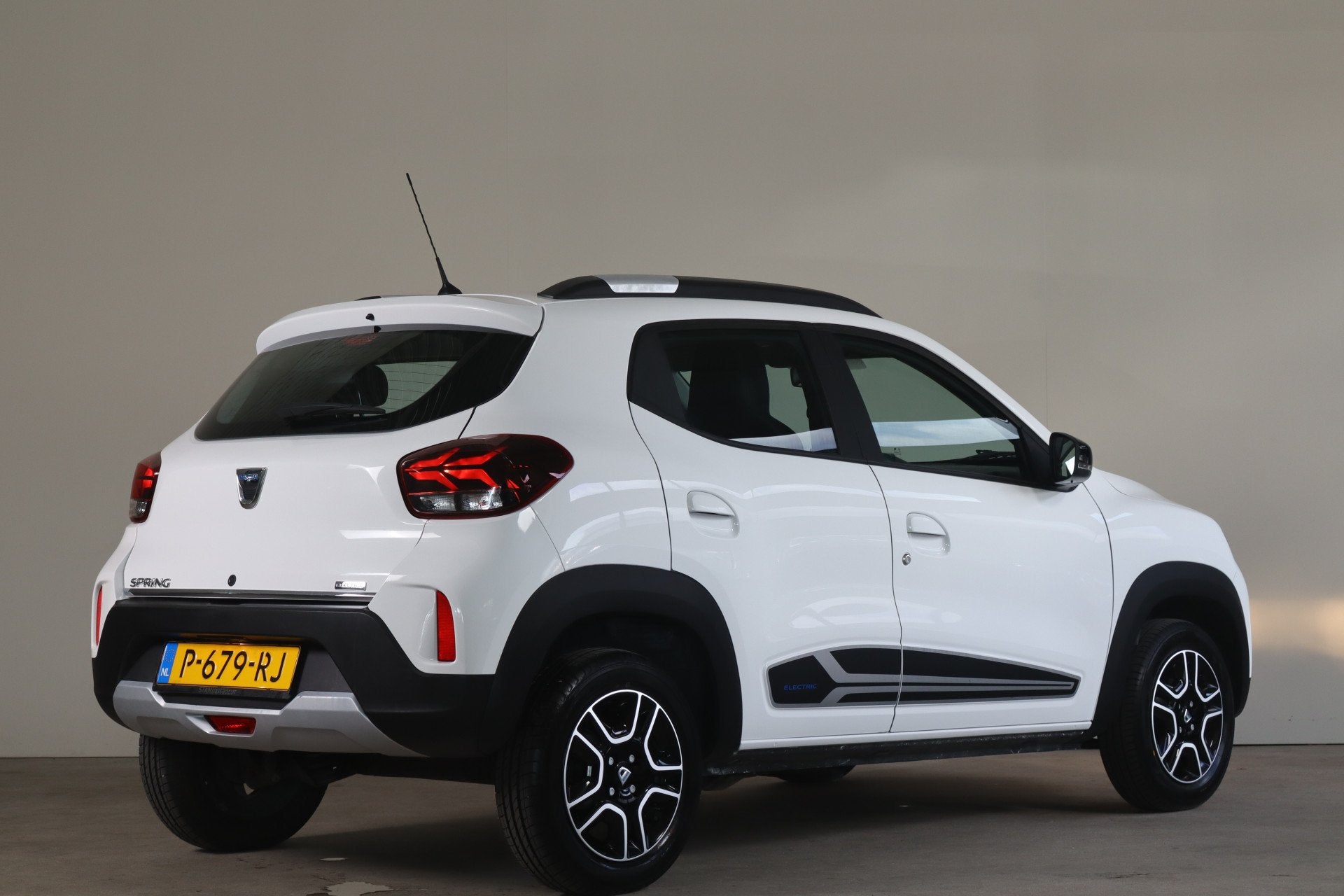 Dacia Spring Comfort 27 kWh - NL- Auto! Airco I Radio I Crui, Auto's, Electronic Stability Program (ESP), Gebruikt, 230 km, Leder en Stof