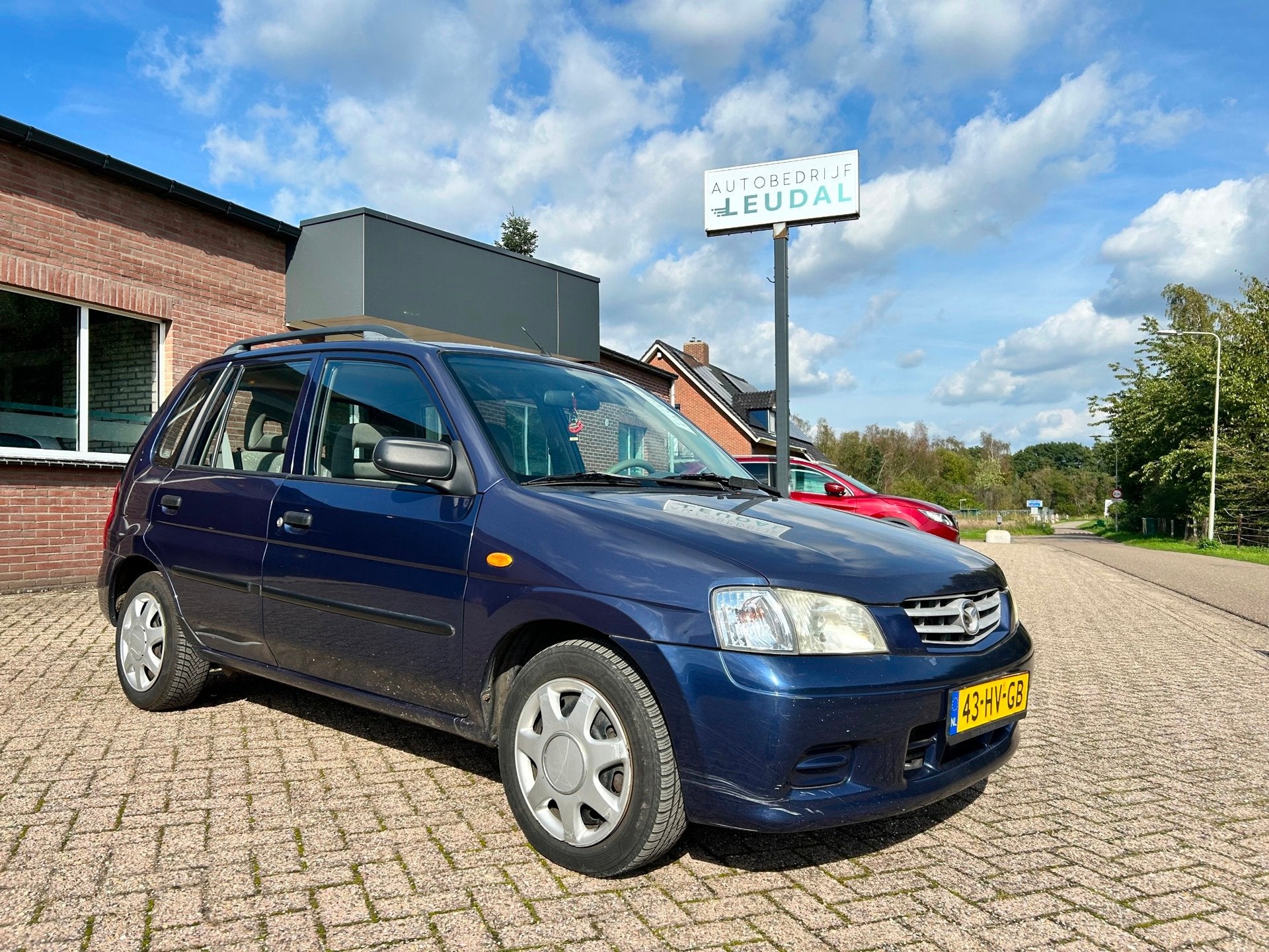 Mazda Demio 1.5 Exclusive // Airco // APK 22-7-2027, Auto's, Blauw, Origineel Nederlands, Bedrijf, 75 pk