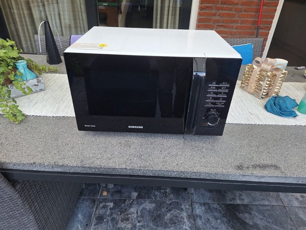 Samsung Combimagnetron - Zo goed als nieuw, Ophalen, Combimagnetron, Gebruikt, Draaiplateau