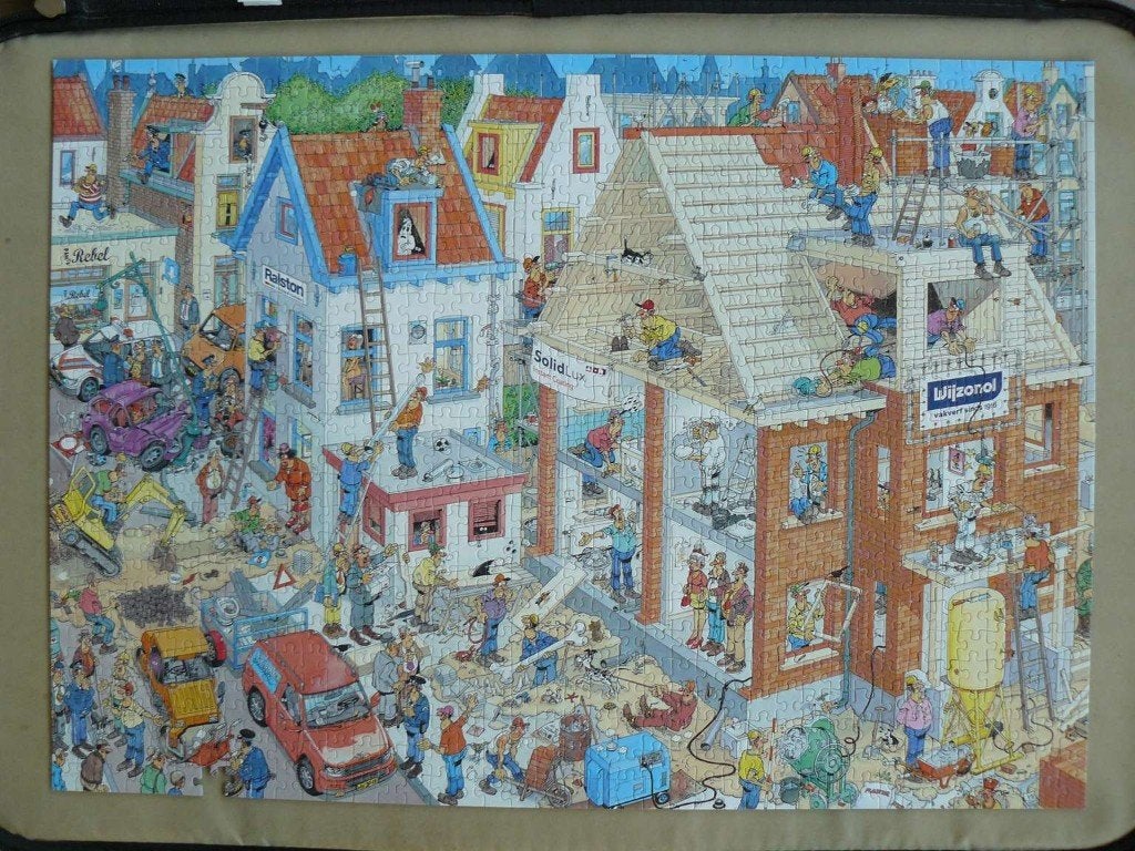 Jan van Haasteren puzzel Samen Bouwen Collectors item., Ophalen of Verzenden, 500 t/m 1500 stukjes, Zo goed als nieuw, Legpuzzel