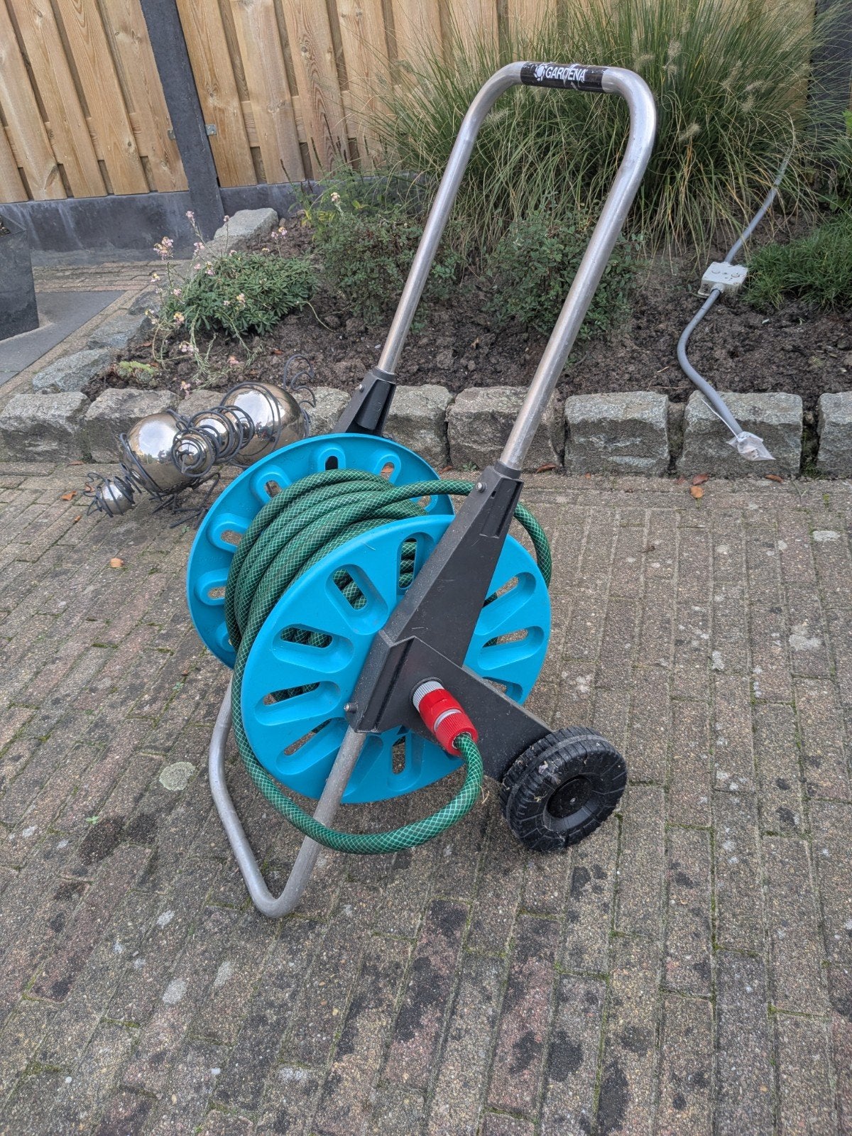 Gardena slangwagen., Tuin en Terras, Ophalen