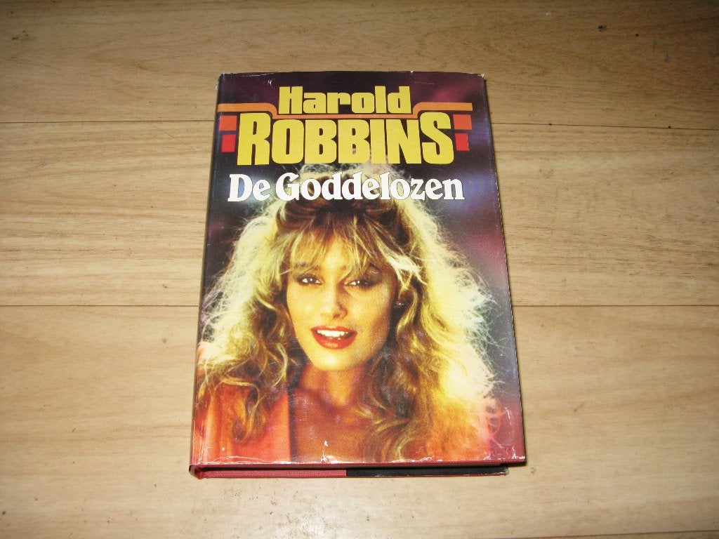 Harold Robbins - De Goddelozen, Ophalen of Verzenden, Gelezen