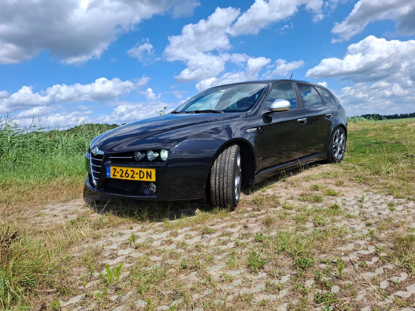 Alfa Romeo 159 1.750 TBi ECO 200PK 2010 Zwart, Auto's, Voorwielaandrijving, Euro 5, 4 cilinders, Navigatiesysteem