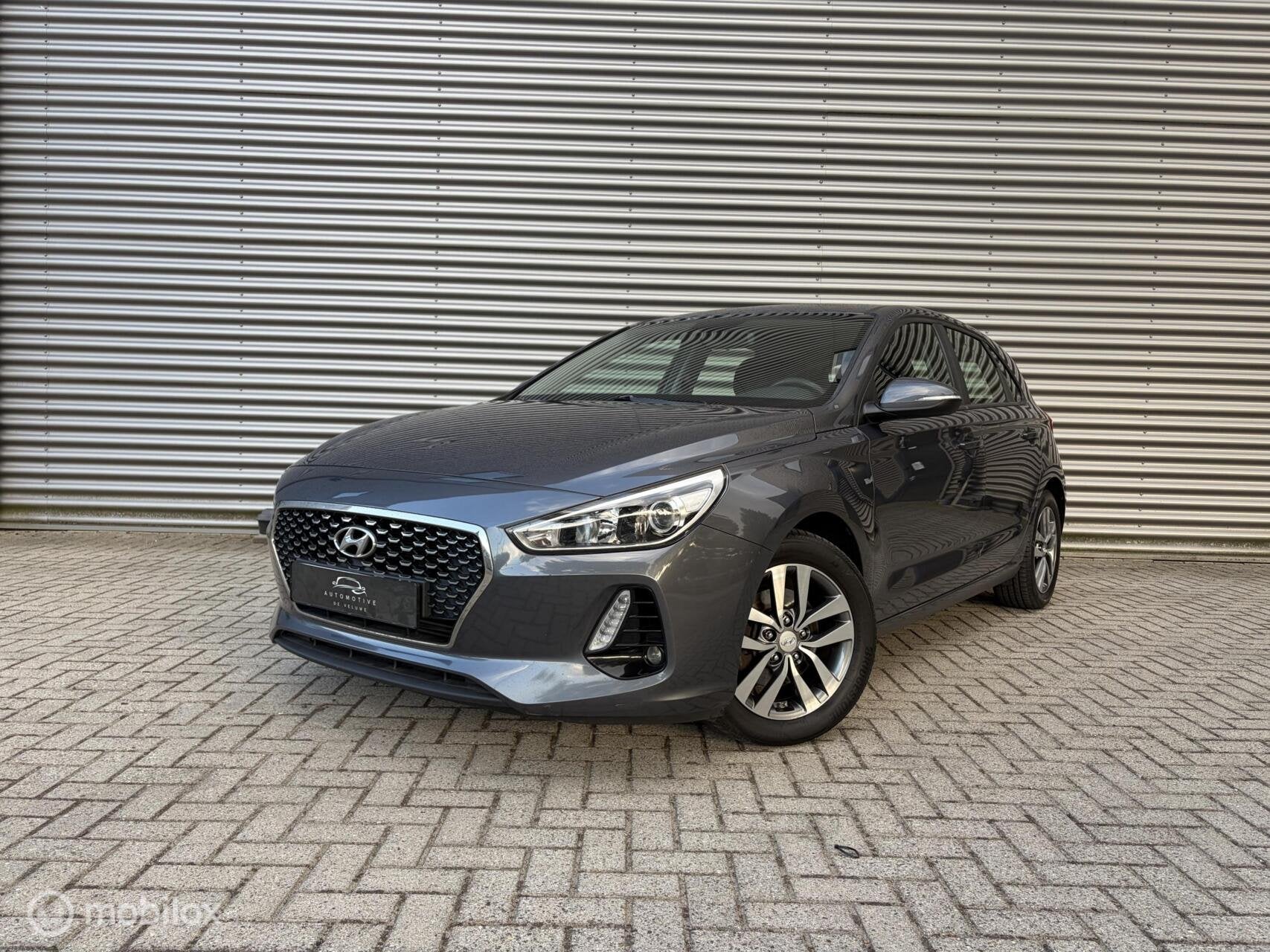 Hyundai i30 1.0 T-GDI Premium/NW APK/CRUISE/PDC/TRKHK/VOLL, Auto's, Stof, Bedrijf, Handgeschakeld, 3 cilinders