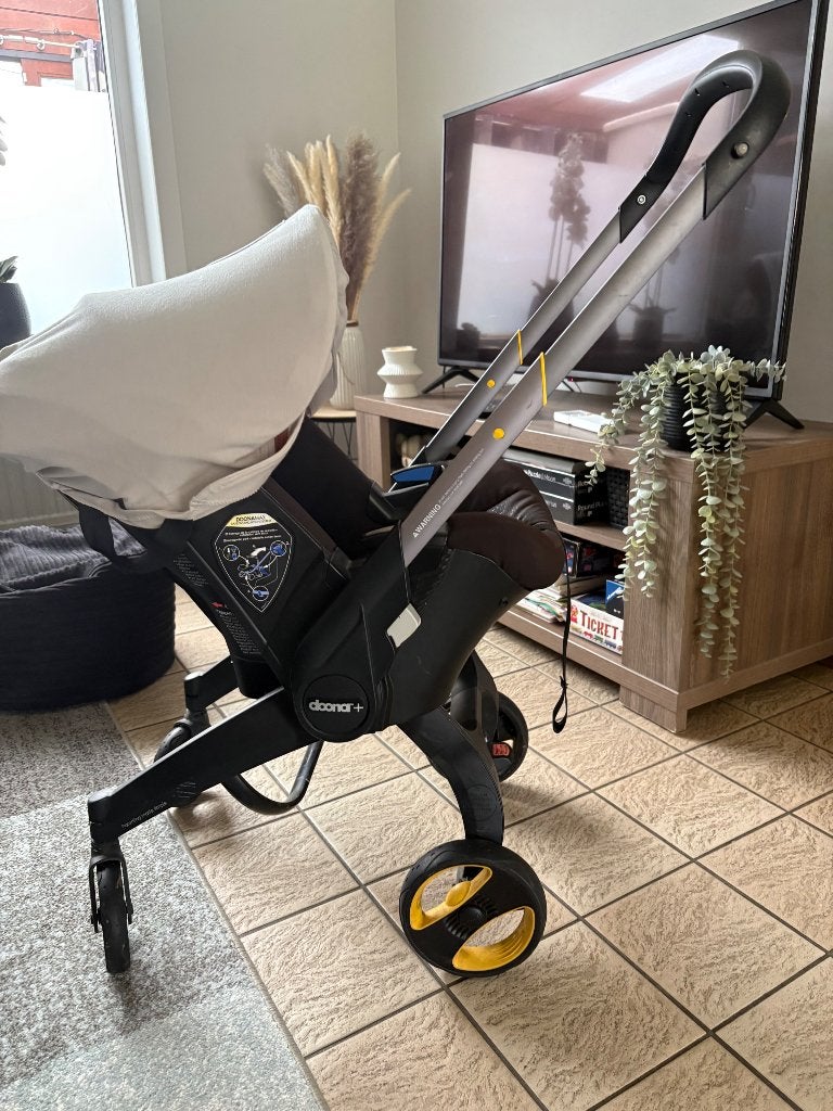 Doona, Verstelbare duwstang, Zo goed als nieuw, Ophalen, Kinderwagen