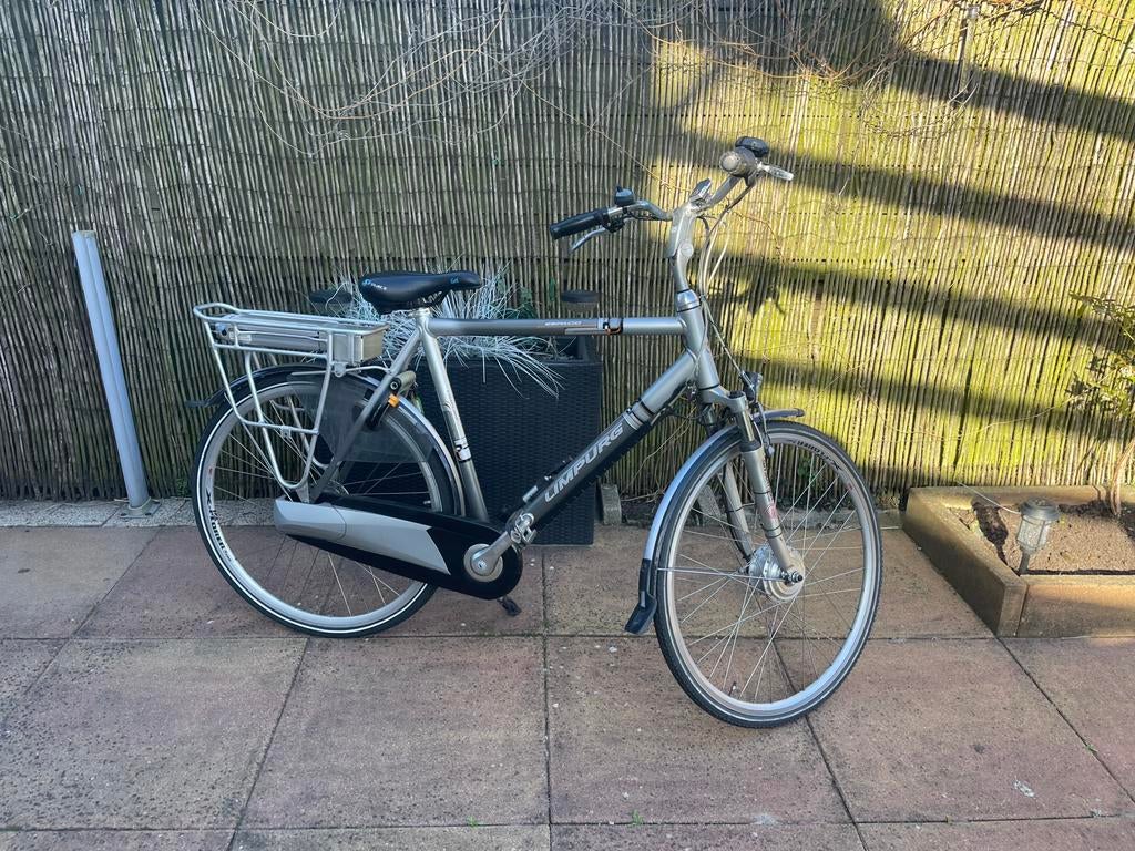 Elektrische heren fiets, Zo goed als nieuw, 50 km per accu of meer, 55 tot 59 cm, Ophalen