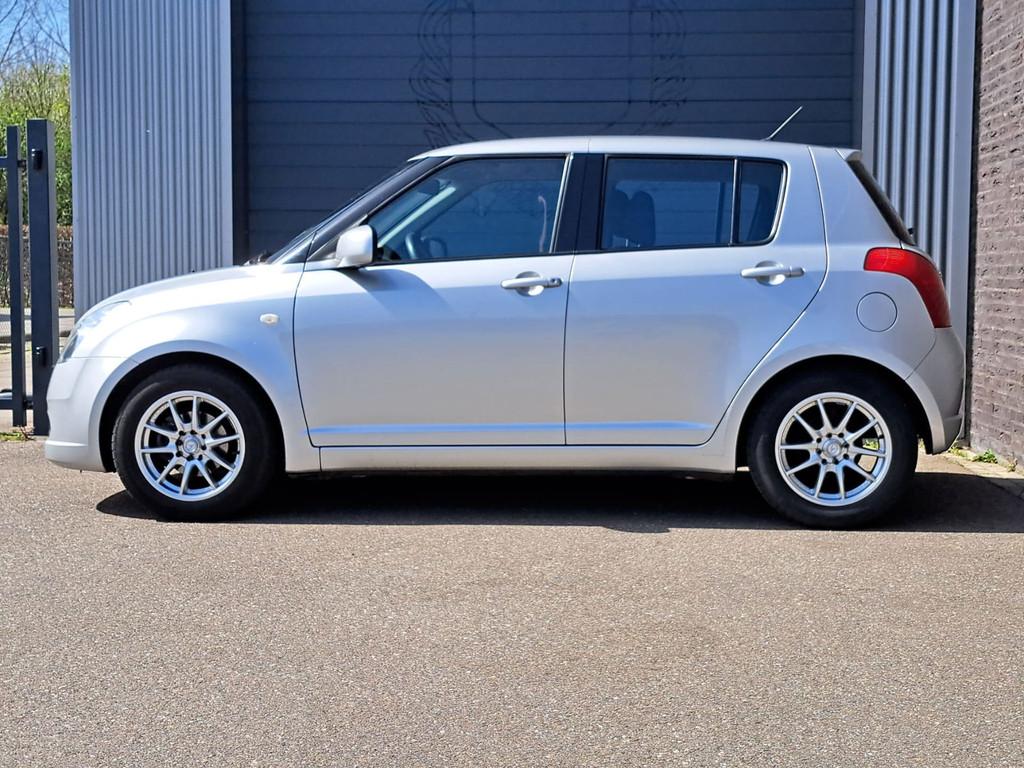Suzuki Swift 1.3 Shogun Airco|Nap, Auto's, Suzuki, Voorwielaandrijving, Stof, 965 kg, 400 kg