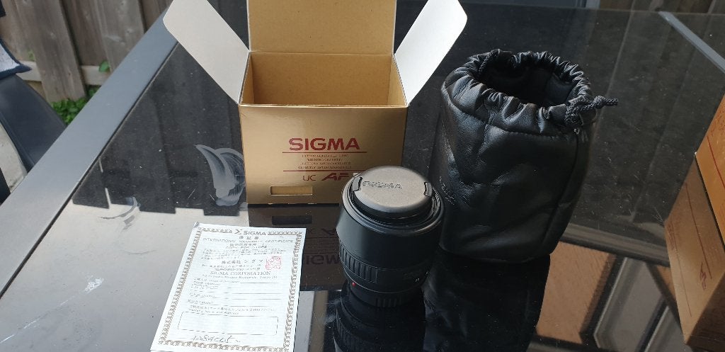 Sigma AF UC 28-70 mm 1:3.5-4.5, Ophalen of Verzenden, Zo goed als nieuw, Groothoeklens