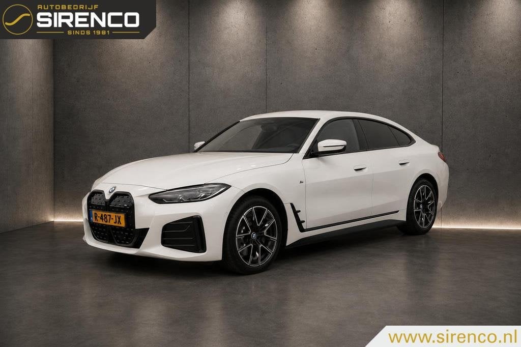 BMW i4 eDrive40 High Executive 84 kWh | M sport | virtual wi, Auto's, BMW, Achterwielaandrijving, Gebruikt, Zwart, Met garantie (alle)