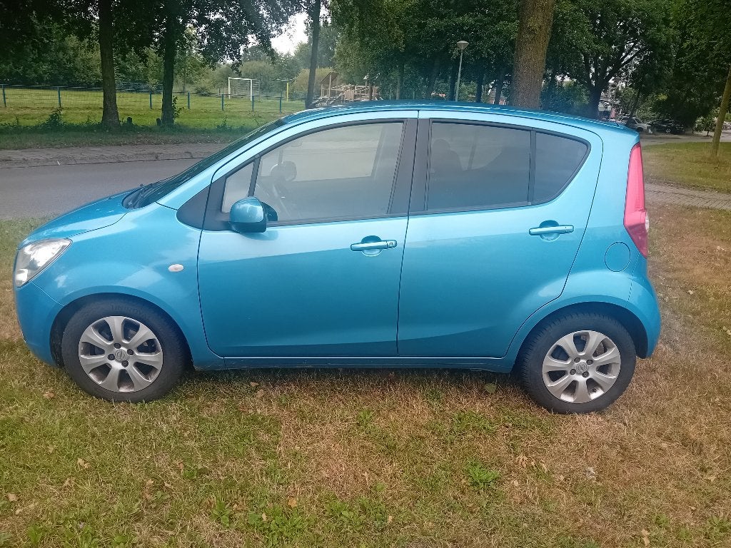 Opel Agila 1.2 AUTOMAAT 2010, Stof, 1242 cc, 4 cilinders, Blauw