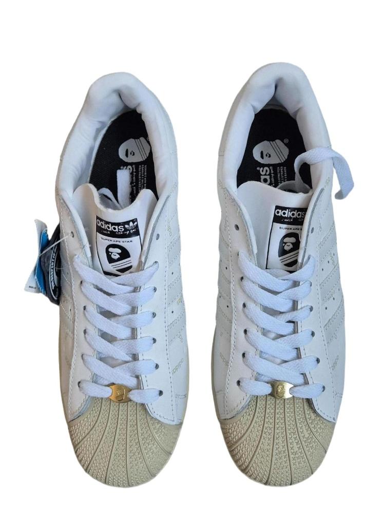 Adidas Superstar x Bape “Super Ape Star” – White Edition, Kleding | Heren, Schoenen, Wit, Nieuw, Ophalen of Verzenden, Sneakers of Gympen