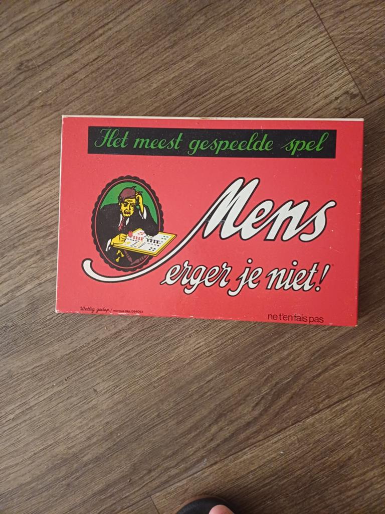Mens erg niet, Ophalen of Verzenden